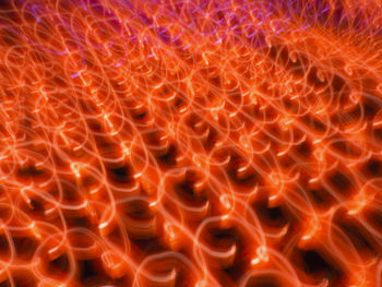 Full frame shot of fire crackers against black background
