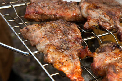 Close-up of meat on barbecue grill