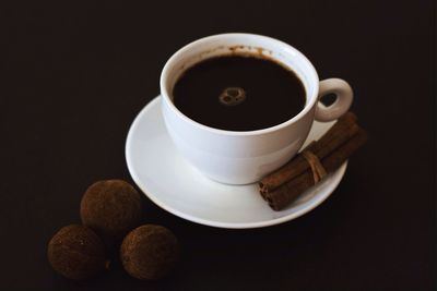 Close-up of coffee cup on table
