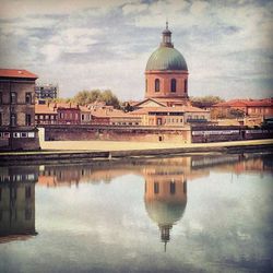 View of river with buildings in background