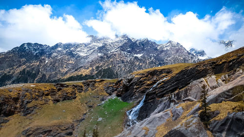 Scenic view of snowcapped mountains against sky