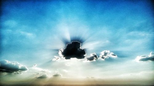 Low angle view of blue sky and clouds