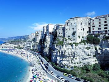 Panoramic view of buildings against blue sky