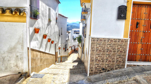 Alley amidst buildings in town