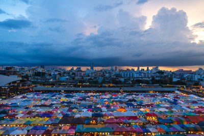 High angle view of buildings against sky during sunset