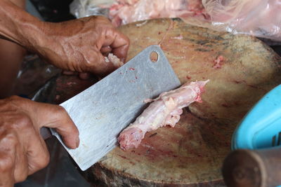 Close-up of man preparing food