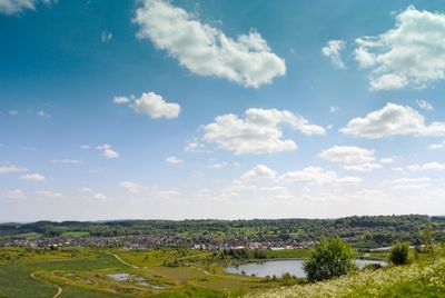 Scenic view of landscape against cloudy sky
