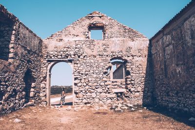 Old ruin building against clear sky