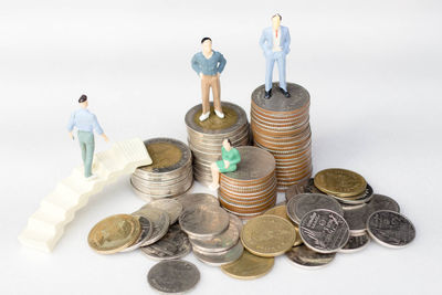 High angle view of coins on table