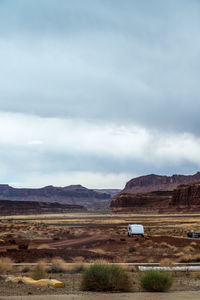 Surrounding scenery of red rock formations and canyons at hite marina campground in utah
