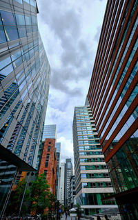 Low angle view of skyscraper against sky