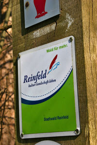 High angle view of information sign on table