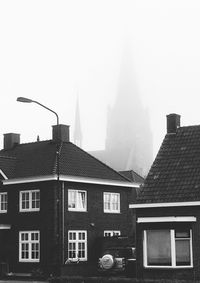 View of buildings in city against sky