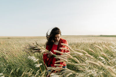 Young woman standing in farm