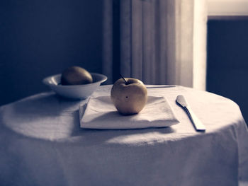 Close-up of eggs in plate on table