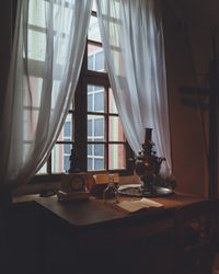 View of lamp on table at home