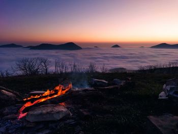 Scenic view of sea against clear sky during sunset