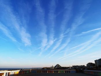 City buildings against blue sky