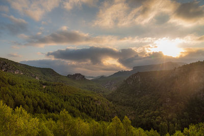 Scenic view of mountains against sky during sunset