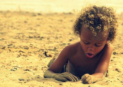 Woman sitting on beach