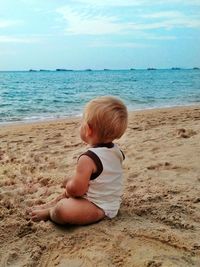 Child on sand at beach