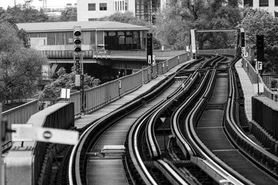 High angle view of train on railroad tracks in city