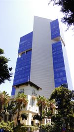 Low angle view of building against clear blue sky