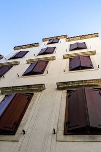 Low angle view of house against clear sky