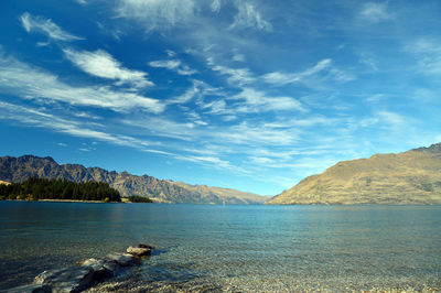 Straight road leading towards a snow capped mountain in new zealand