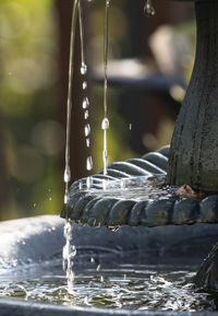 Water falling from a garden fountain