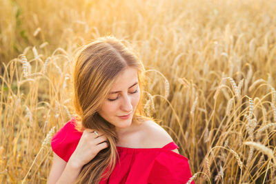 Portrait of a teenage girl in the field