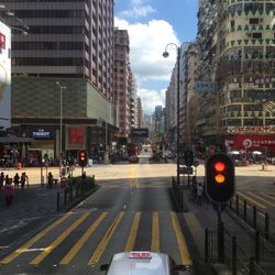 City street against cloudy sky