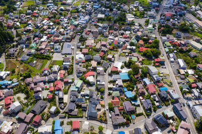 High angle view of street amidst buildings in town