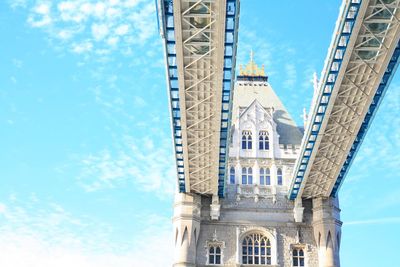 Low angle view of tower bridge against sky