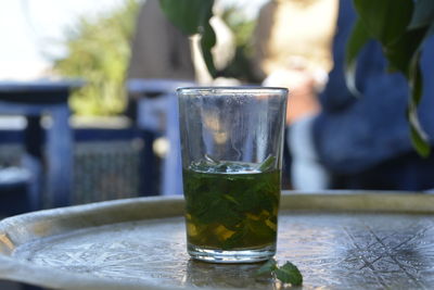 Close-up of beer glass on table