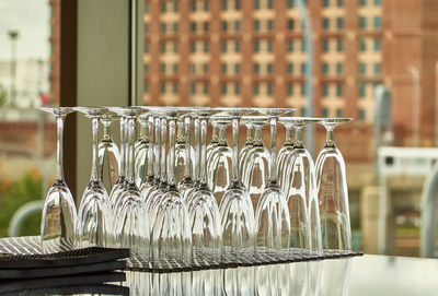 Empty glass bottles on table in restaurant