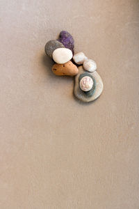 High angle view of pebbles on table