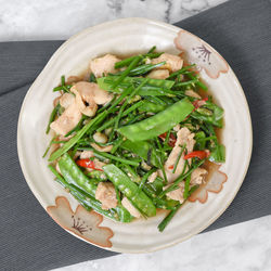 High angle view of salad in bowl on table