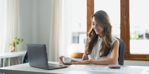 Businesswoman working at office