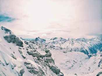 Scenic view of snow covered mountains