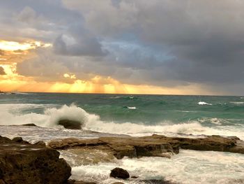 Scenic view of sea against sky during sunset