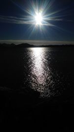 Scenic view of sea against sky at sunset