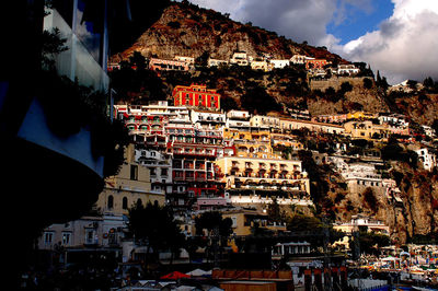 Buildings in city against sky