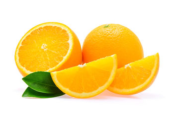 Close-up of orange fruit against white background