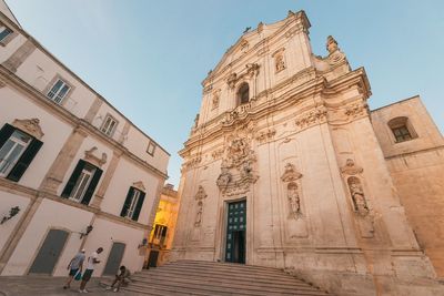 Low angle view of historical building against sky