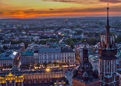 High angle view of city buildings during sunset