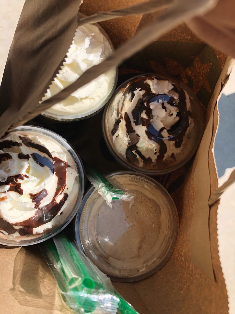 CLOSE-UP OF ICE CREAM ON TABLE