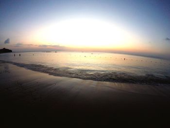 Scenic view of sea at sunset