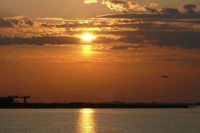 Scenic view of sea at sunset