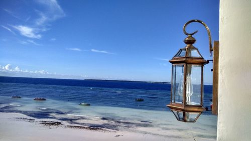 Scenic view of sea against blue sky